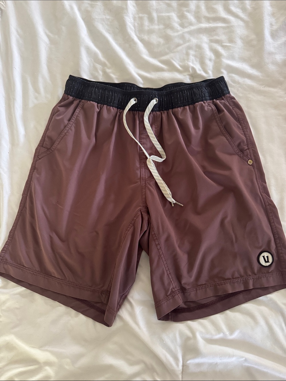Vuori Men's Kore Athletic Shorts in Mauve with Black Waistband